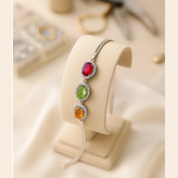 خرید دستبند سه نگینه از یاقوت سرخ و زبرجد و سیترین زنانه از گالری نقره بقیع