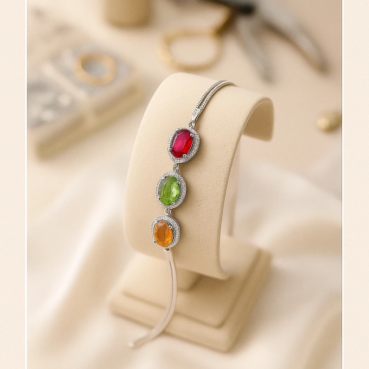 خرید دستبند سه نگینه از یاقوت سرخ و زبرجد و سیترین زنانه از گالری نقره بقیع